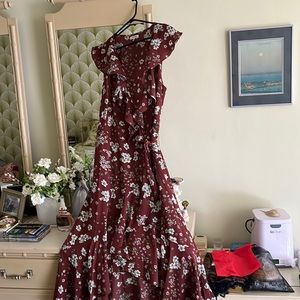 Chestnut colored floral print, ruffle collar, sleeveless summer dress.